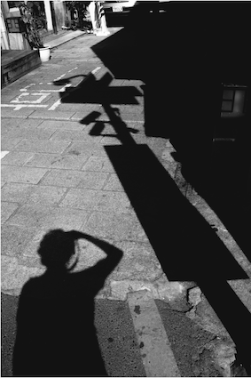 Black and white photography, a picture of shadows in the streets of Tainan, Taiwan.